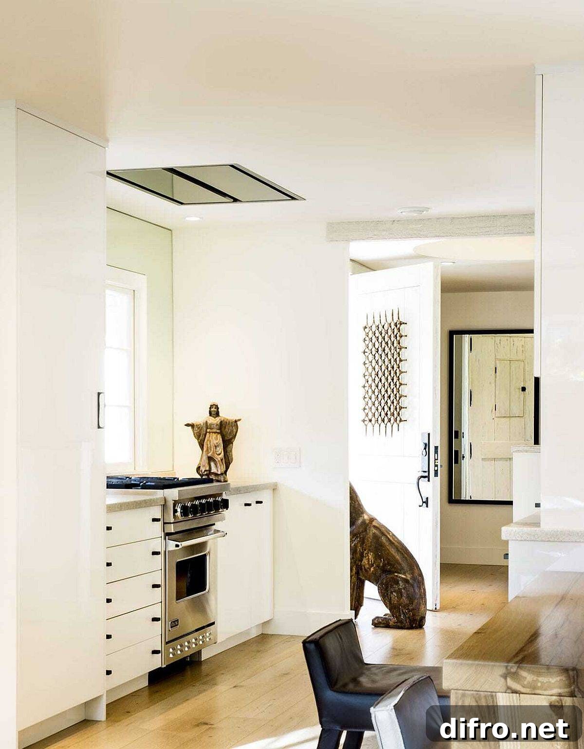 Curated interior of the Pebble Beach cottage showcases the lovely artifact collection of the homeowners