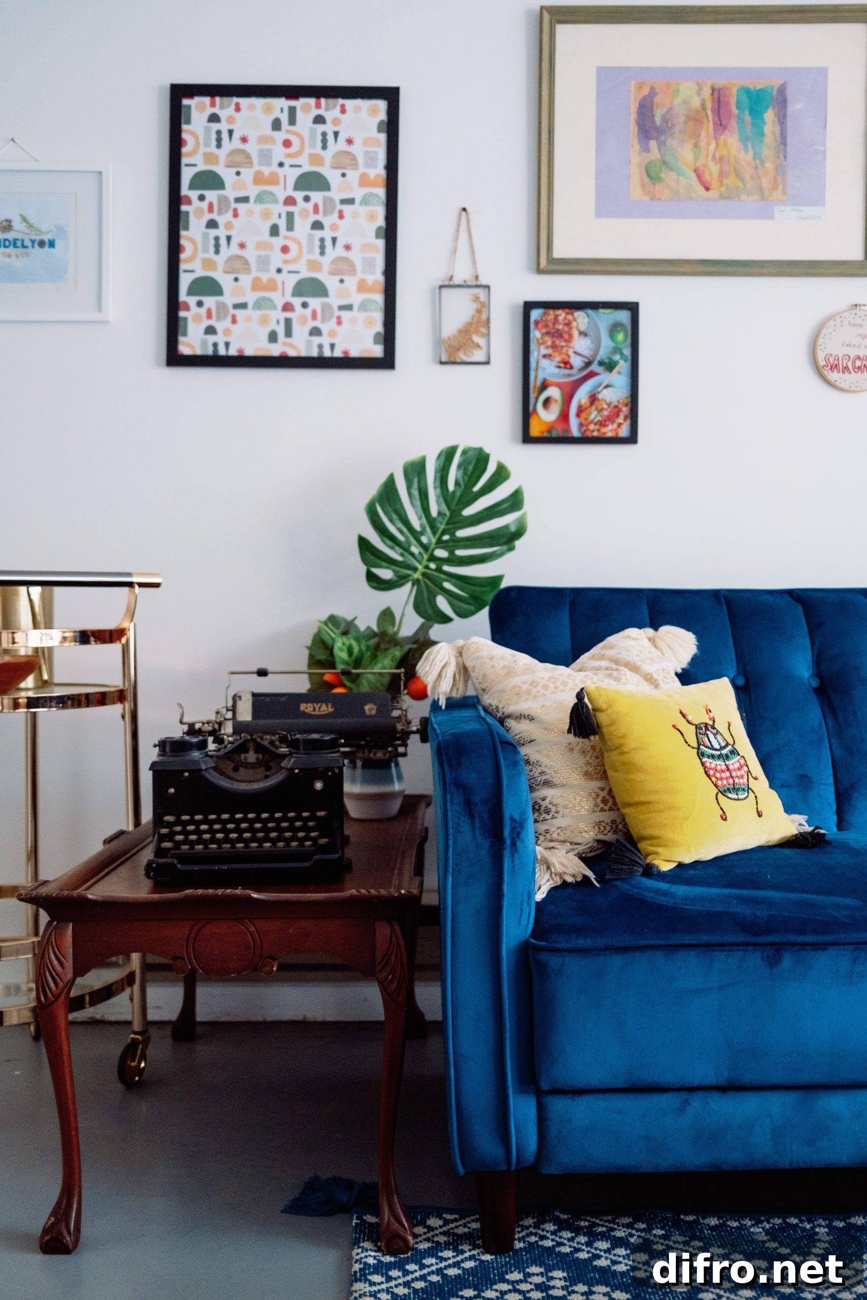 Antique side table next to vibrant sofa