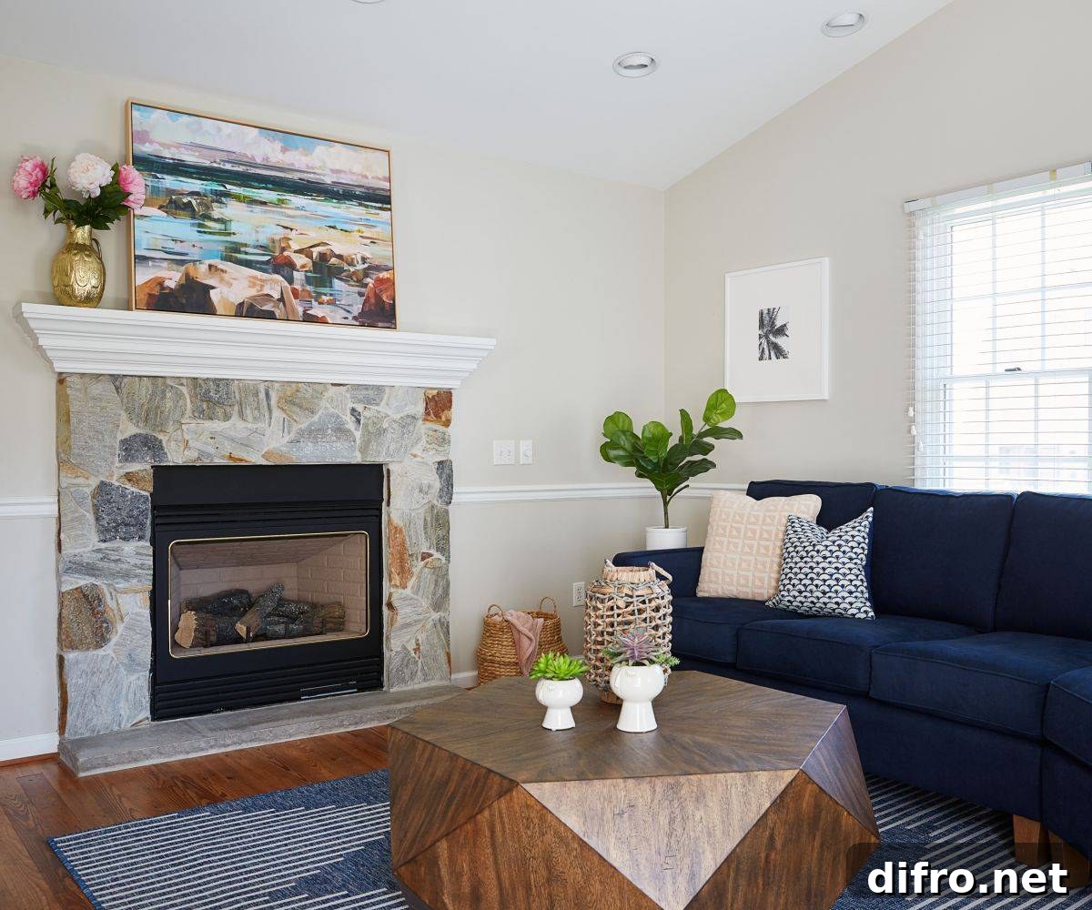 Wall art above the fireplace adding color to a beach style living room