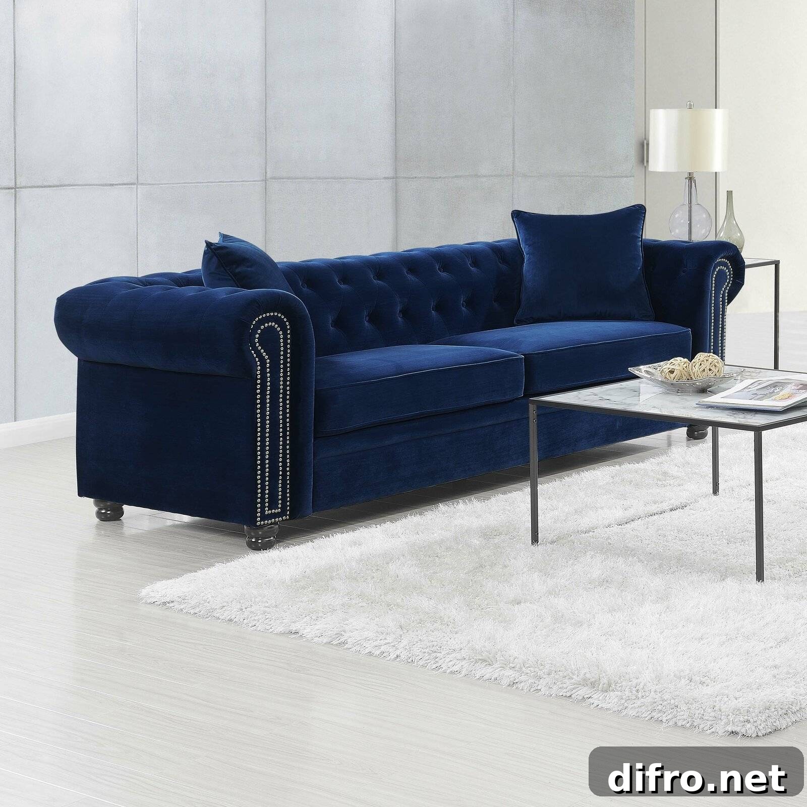 Luxurious blue velvet Chesterfield sofa