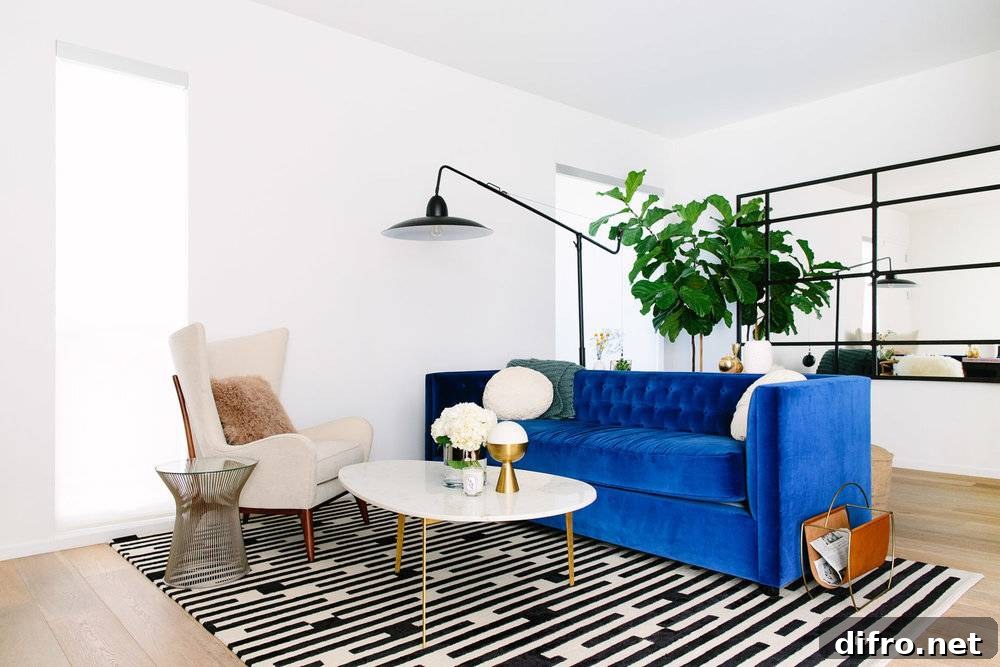 Contemporary living room with blue accent sofa