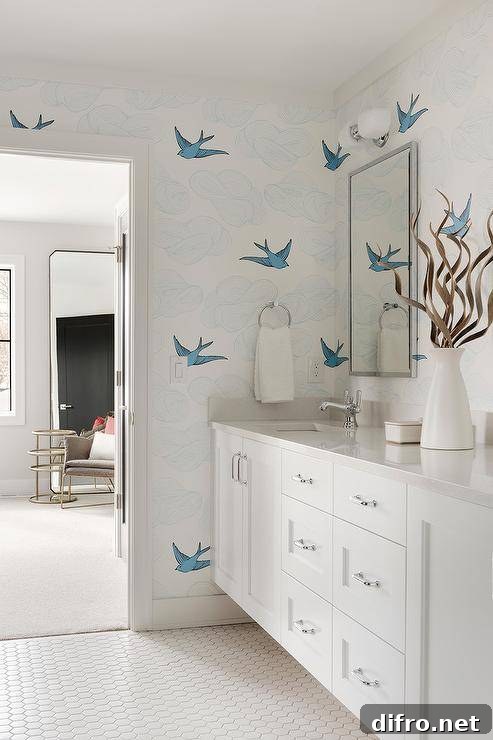 Jack and Jill bathroom with patterned wallpaper