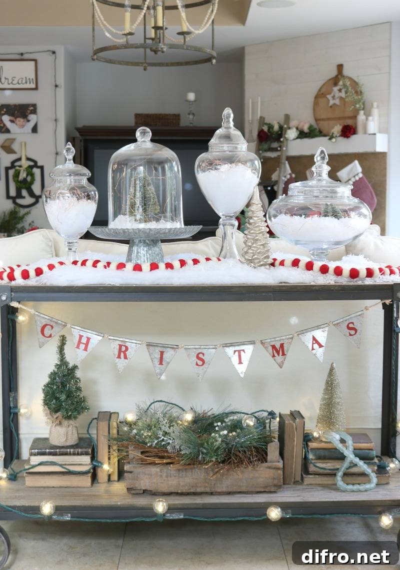 Apothecary jars filled with ornaments and lights