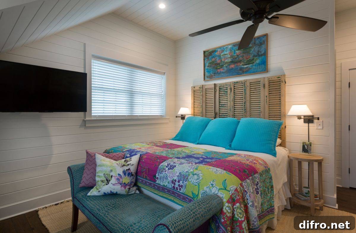 Small beach-style bedroom with shutter headboard