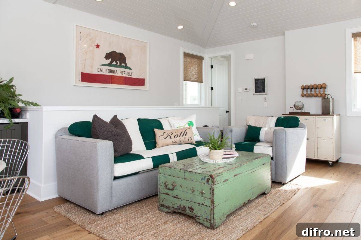 White living room with green accents, trunk coffee table