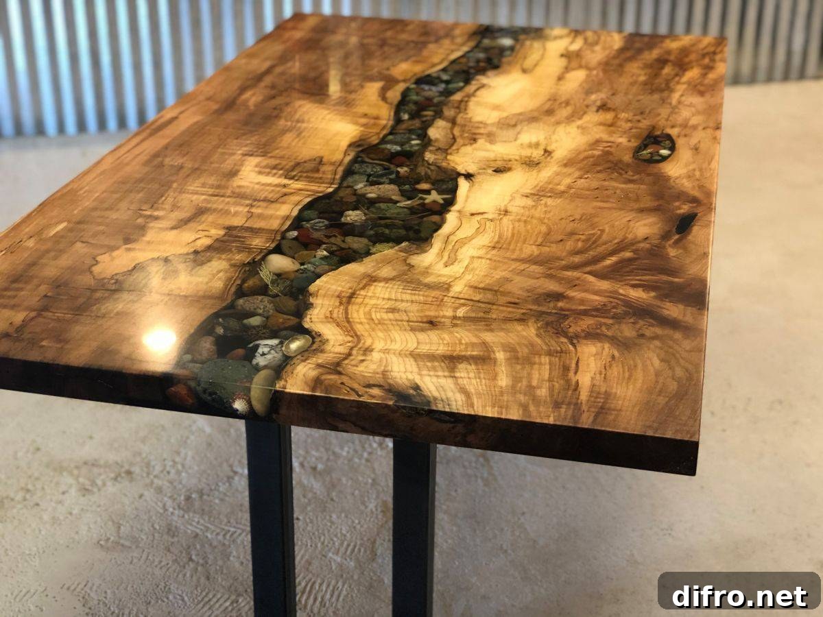 Maple live edge table with shells and epoxy