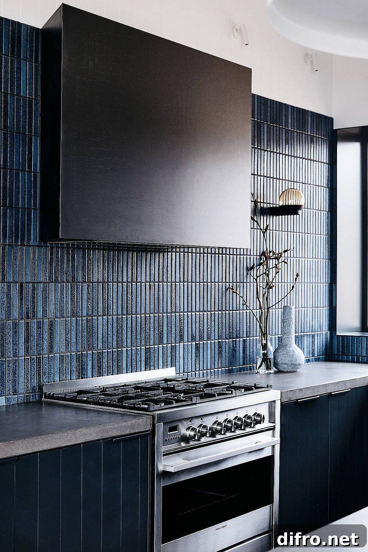 Vertical tile backsplash in varying shades of blue