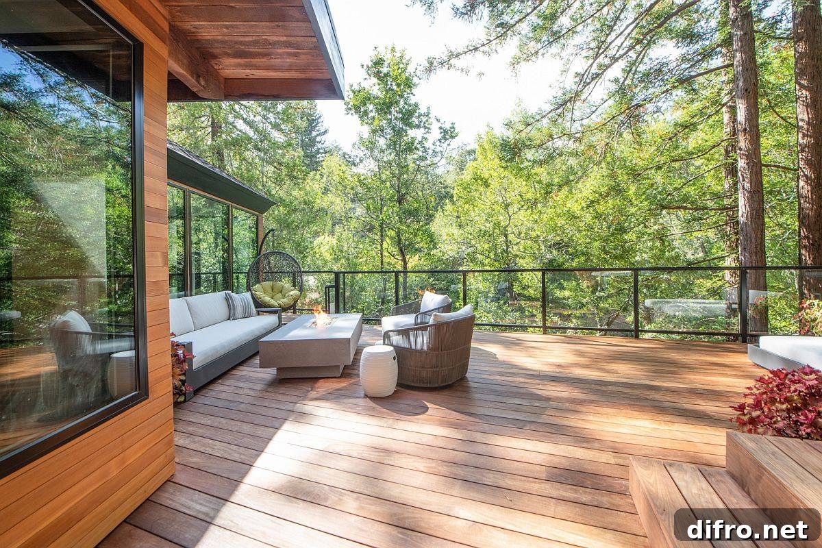 Contemporary deck with green nature views and smart seating