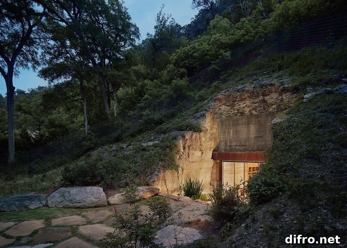 Stone steps and planting lead to wine cave entrance