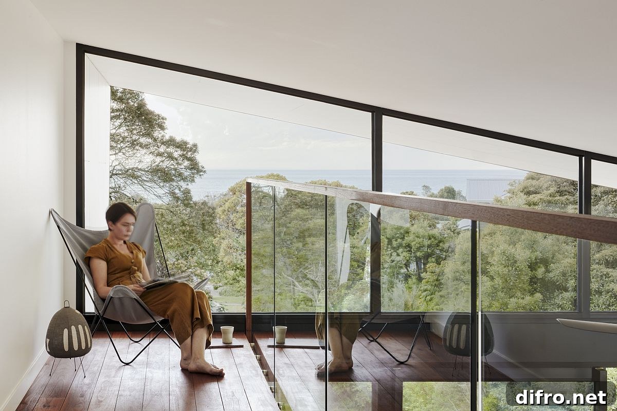 The mezzanine level of the home with reading space also offers amazing views