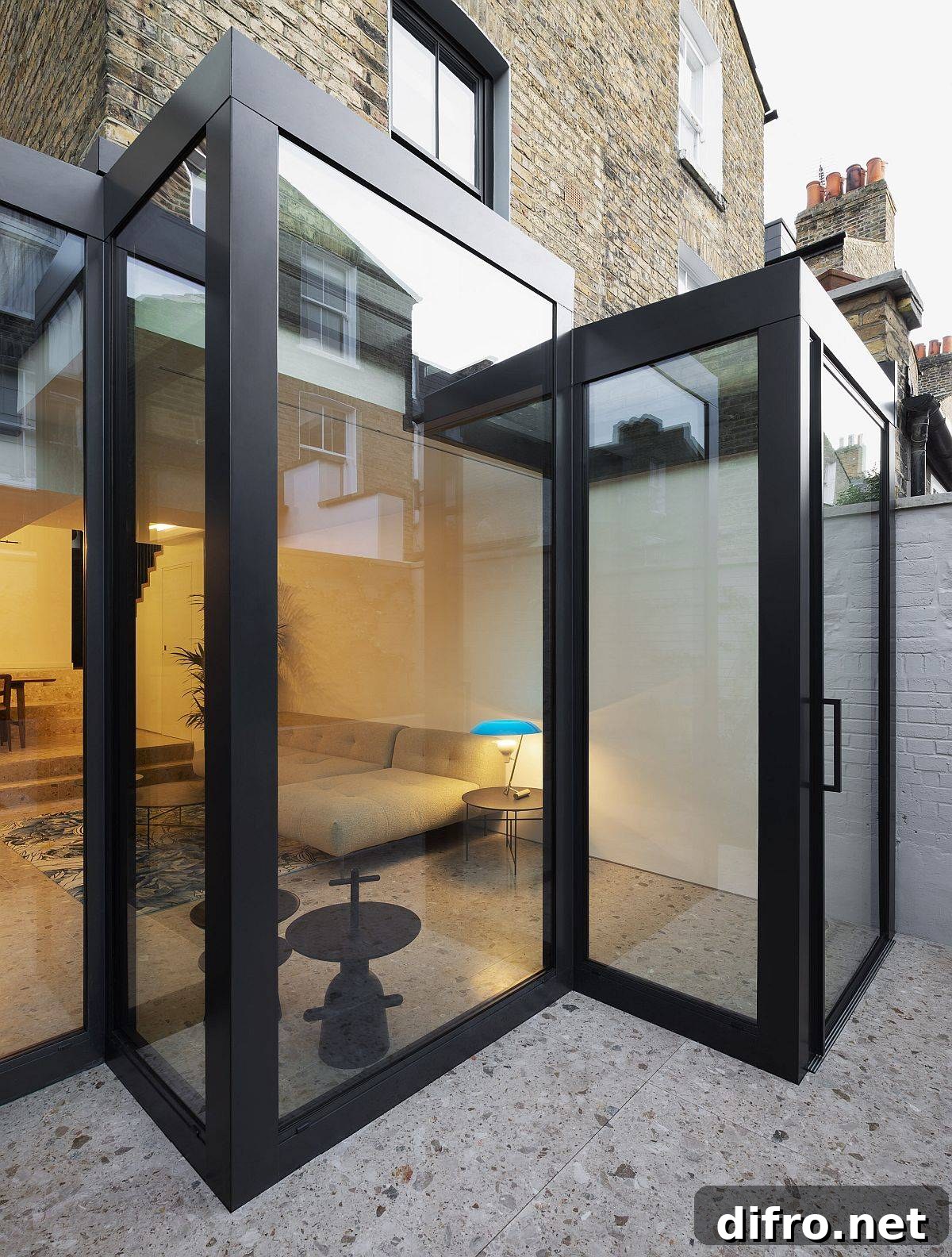 Interlocking geometric glass volumes extend the Victorian terrace