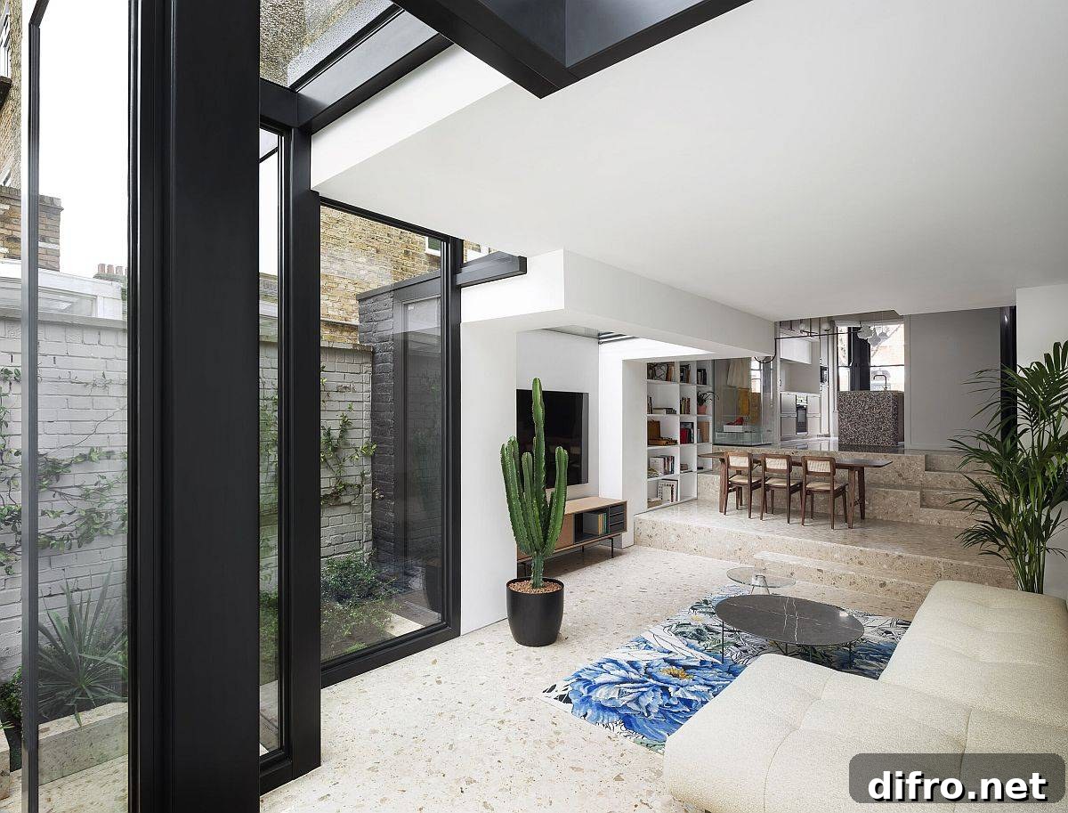 Open-plan living space with kitchen and dining on different levels