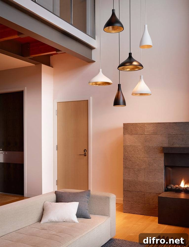 Cluster of modern pendant lights above a table