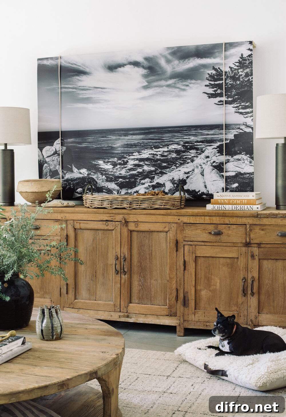 Canvas artwork rolled down to conceal a television