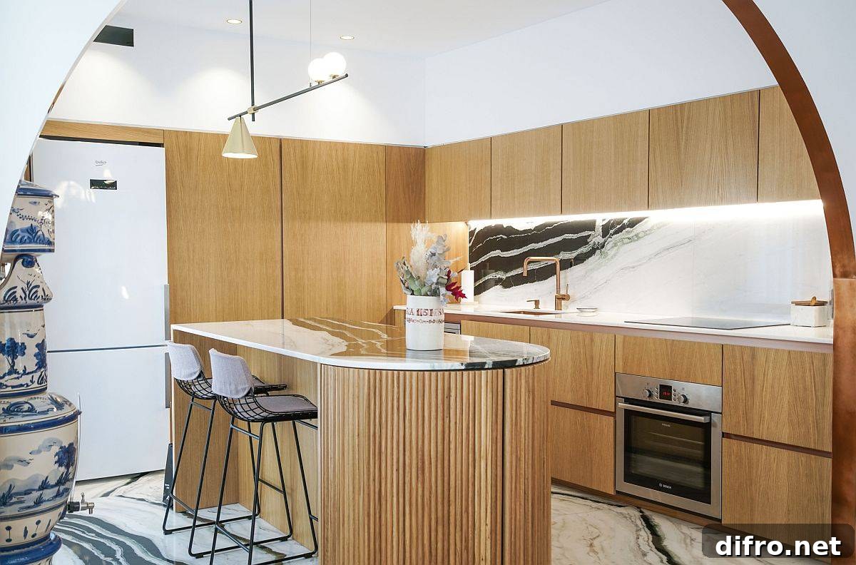 Small contemporary kitchen where flooring complements the stone slab backsplash