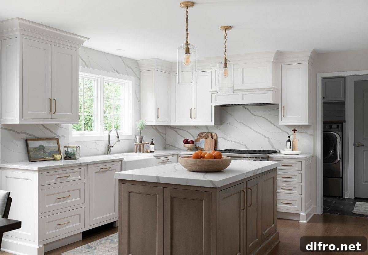 Minimal kitchen with matching stone slab backsplash, counters, and island