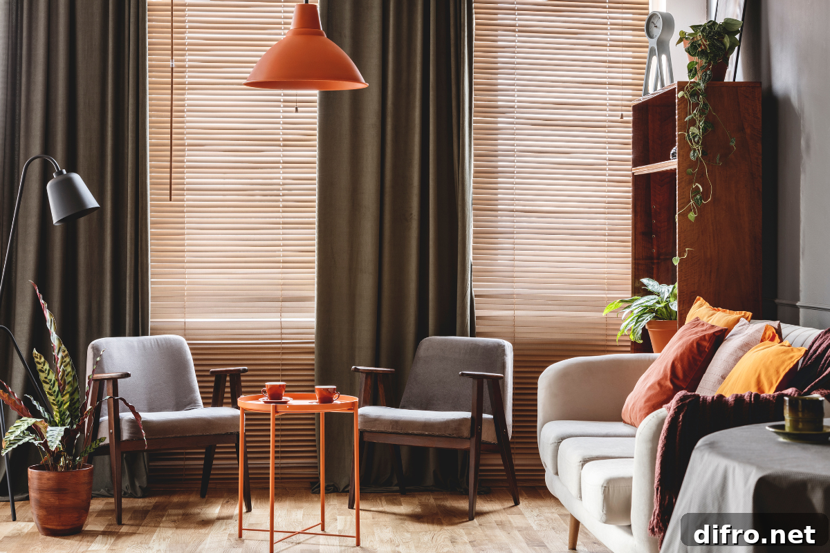 dark living room with chairs bamboo blinds