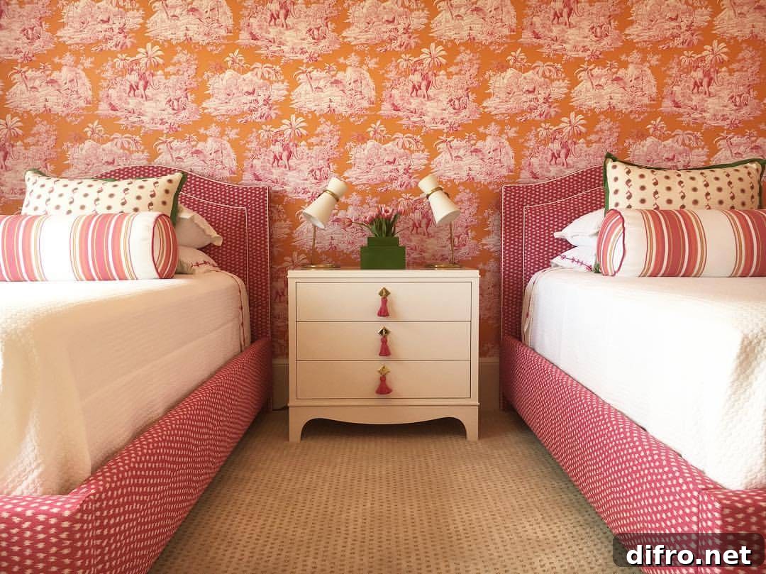 pink and orange wallpaper nightstands tassel drawer pulls lamps white