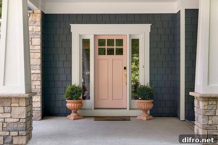 pink door navy siding planter pots urns