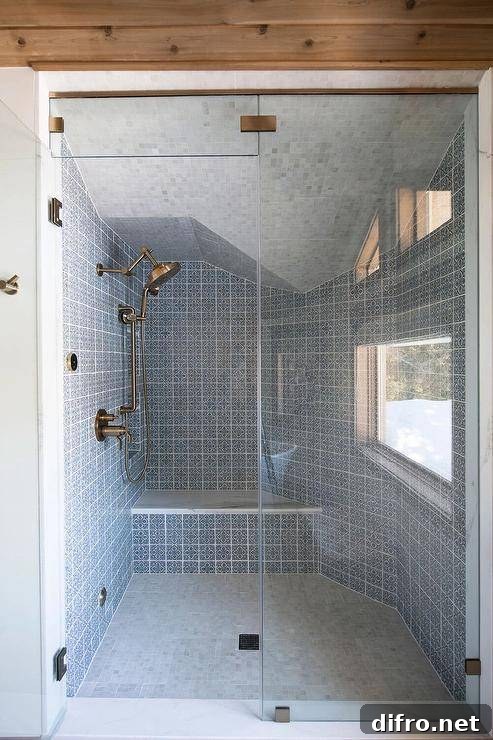 Bathroom features a walk-in shower that boasts blue mosaic Spanish tiles with a brass shower kit