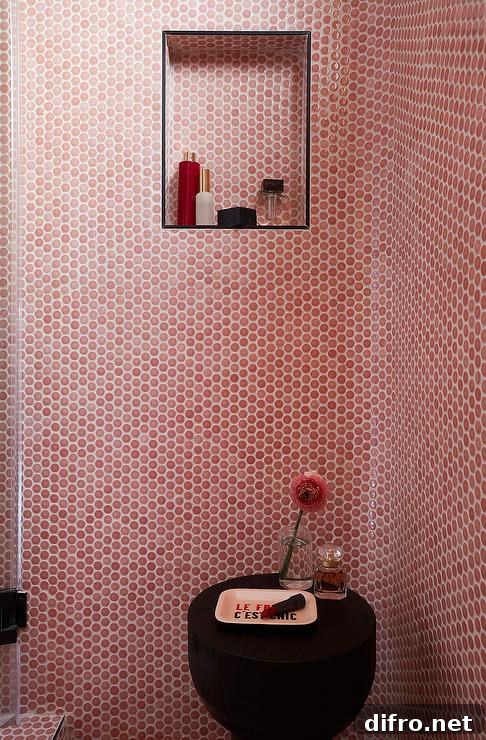Contemporary shower features pink penny tiles with white grout