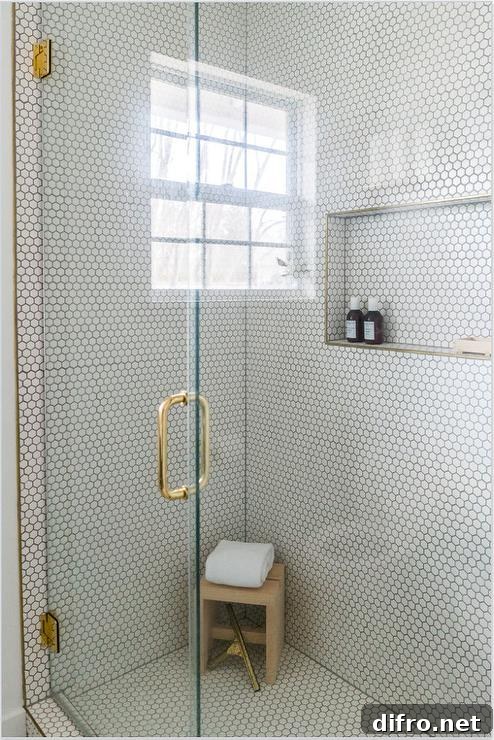 White hexagon shower wall and floor tiles matched with gray grout