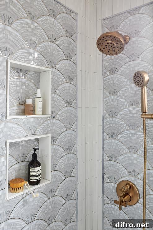 gray mosaic marble fan shaped wall tiles framed by vertical white tiles