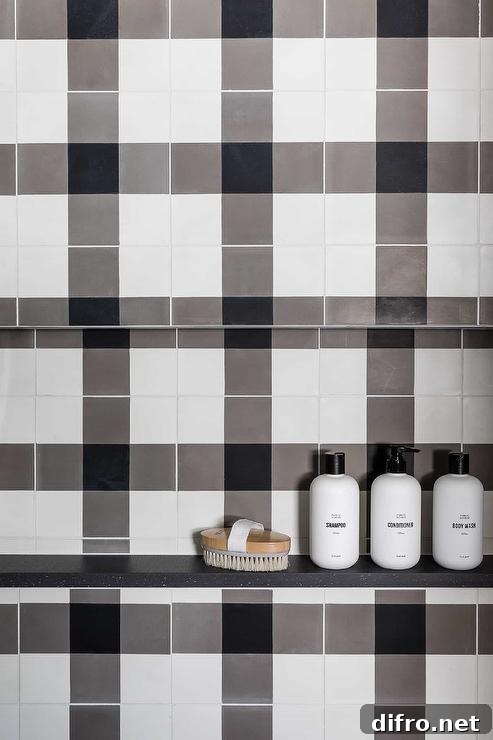 black and white buffalo check tiles in a rectangular tiled shower