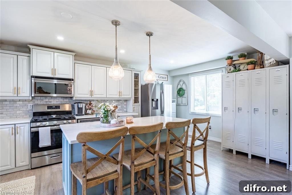 bright kitchen wide shot island with wood stools white lockers hanging pendants grey cabinets