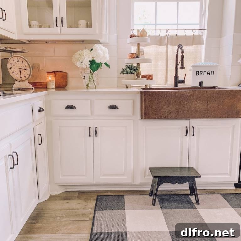 Drop cloth cafe curtains in a white kitchen