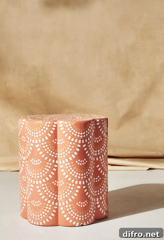 Scalloped coral ceramic side table