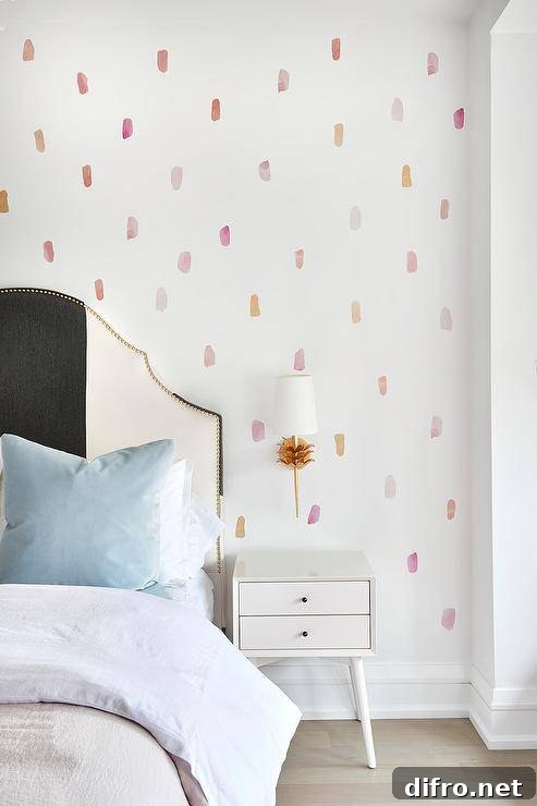 pink spot pastel wallpaper with bed and nightstand