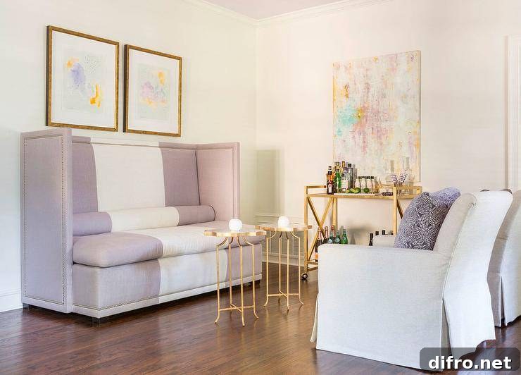 purple pastel couch with white sitting chairs and gold tables