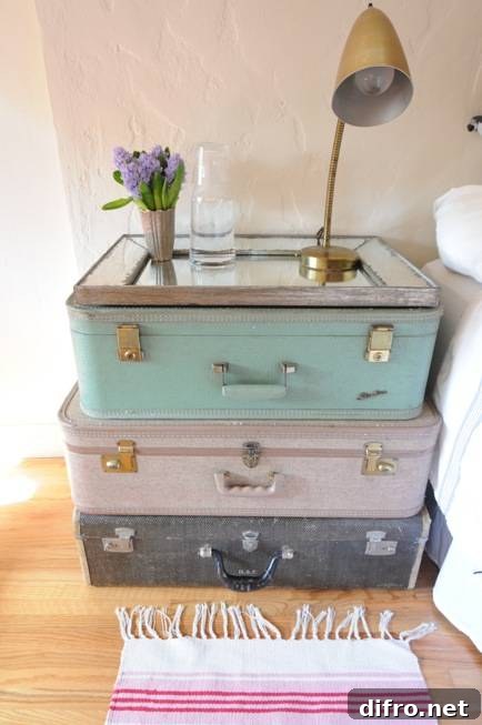 staked suitcase nightstand in pastel colors
