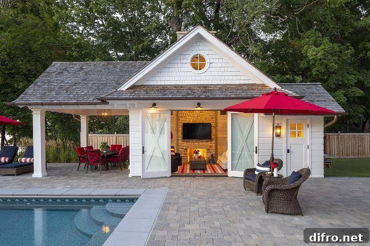 Cabin style pool house features double glass doors with rustic decor and a nautical interior design.