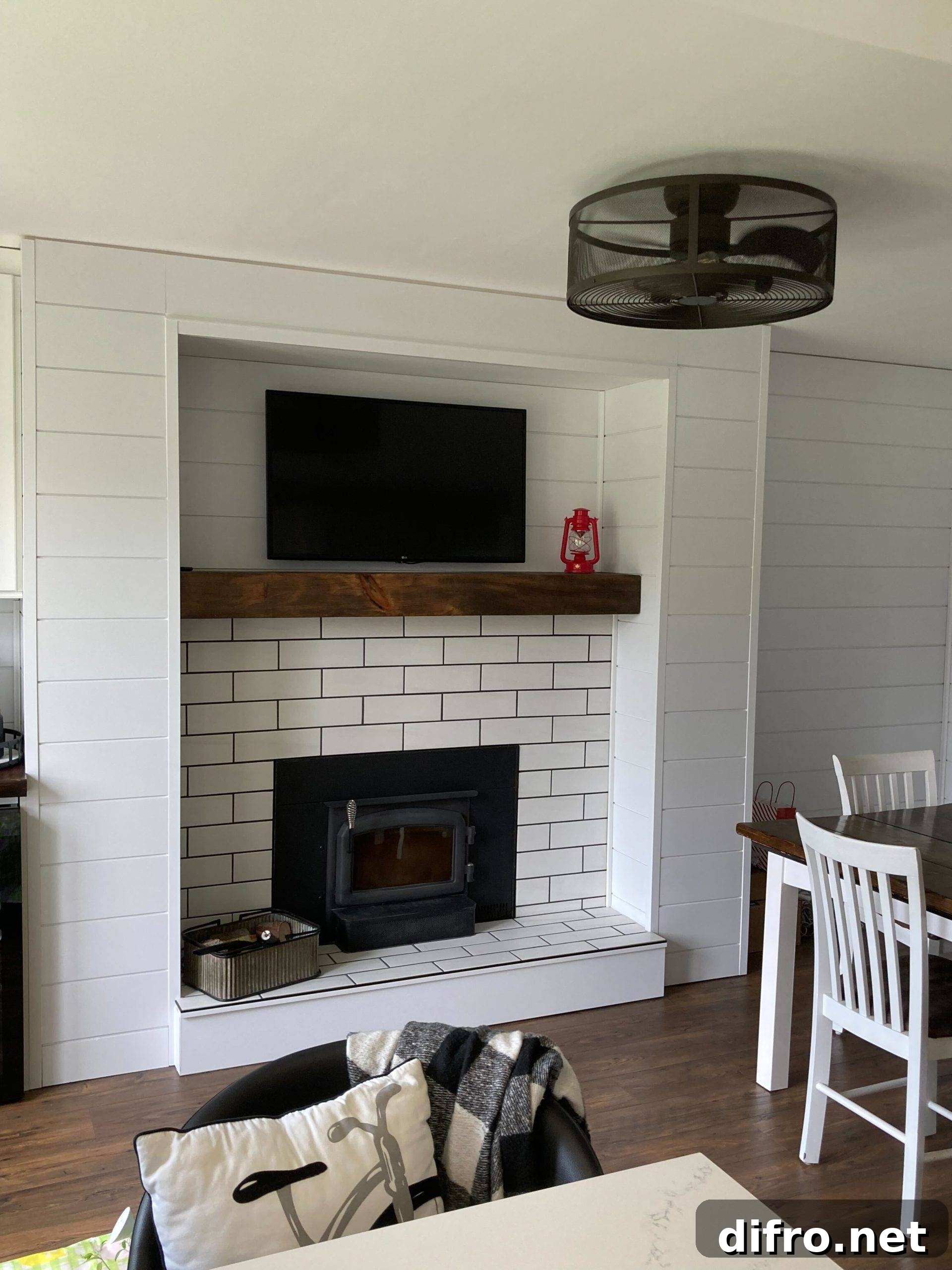 white brick fireplace with wooden mantel