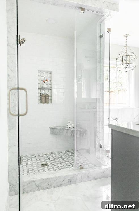 43 Walk-In Shower Ideas to Transform Your Bathroom 26 grey marble shower surround walk in with glass doors and corner marble bench