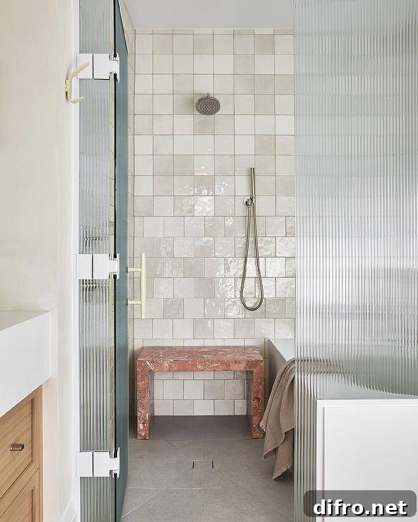 43 Walk-In Shower Ideas to Transform Your Bathroom 6 white ceramic wall tile walk in shower with red marble waterfall bench