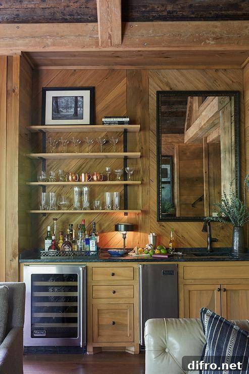 Country wet bar features iron and wood shelves mounted against a salvaged wood backsplash beside a black framed mirror.