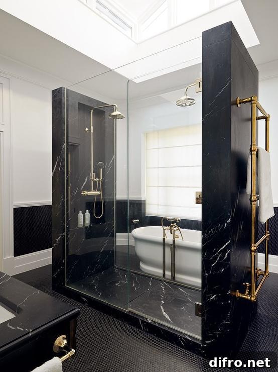 His-and-hers showerheads in a black marble walk-in shower