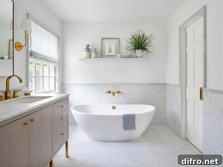 Marble-clad bathtub and marble wainscot wall