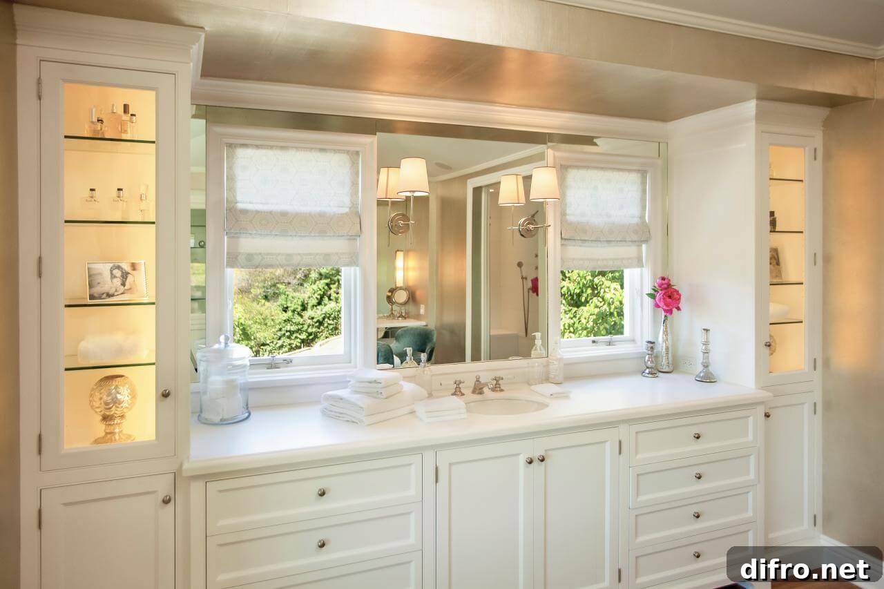 country white bathroom master cabinetry with double vanity and large window