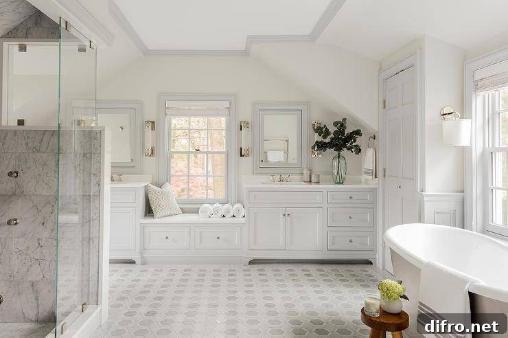 master bathroom with marble hexagon floor tiles and a built-in window seat