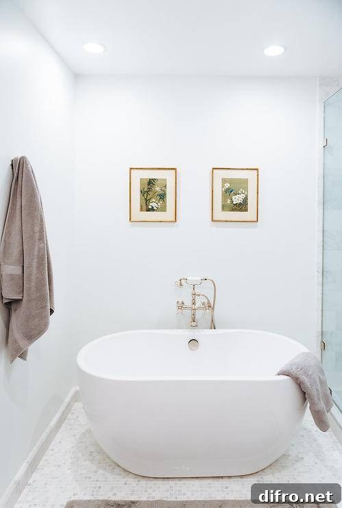 freestanding tub on marble grid floor