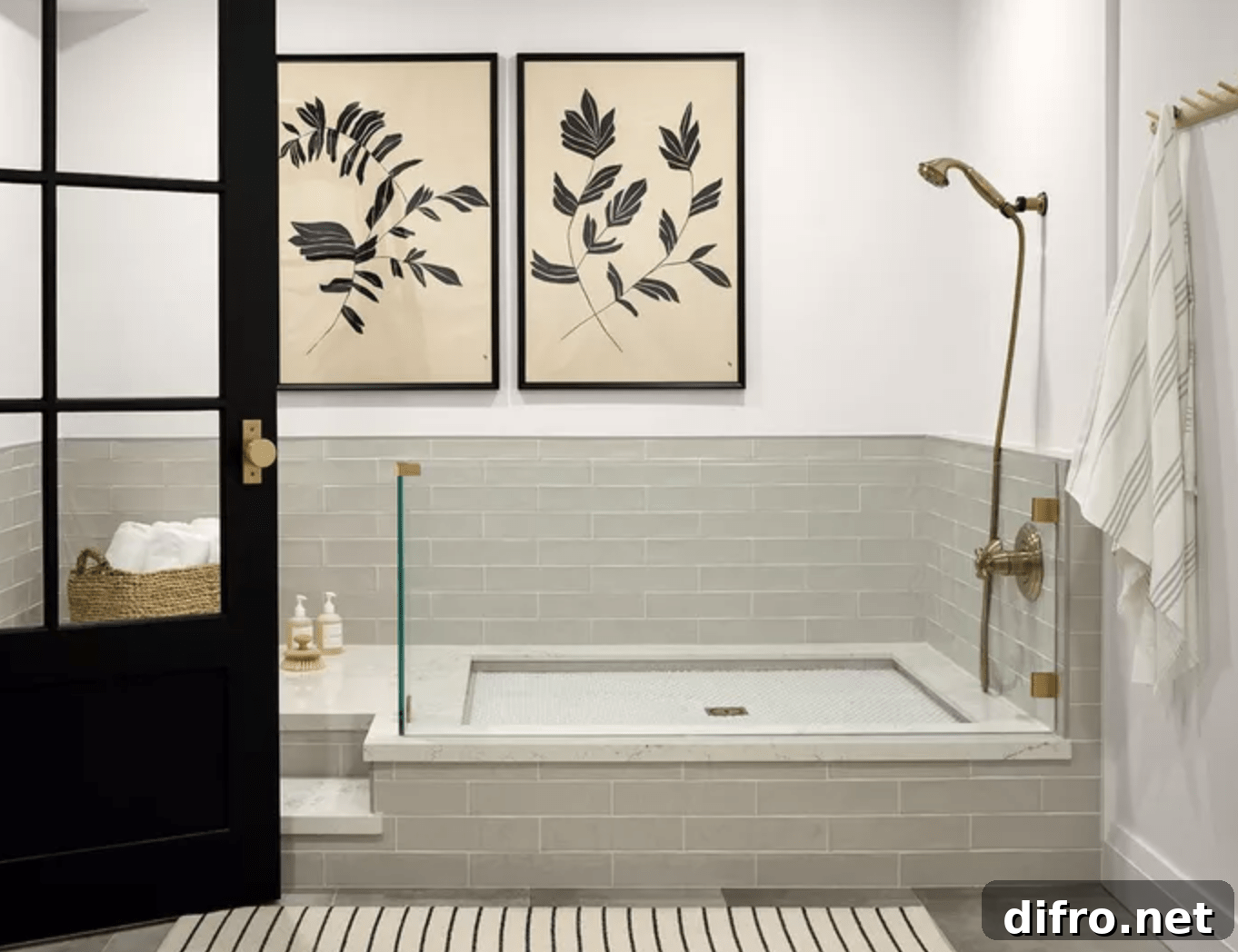 dog shower in basement bathroom grey subway tiles shower head black door framed wall art