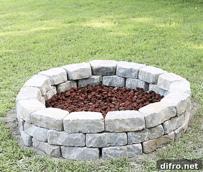 stone fire pit in grass