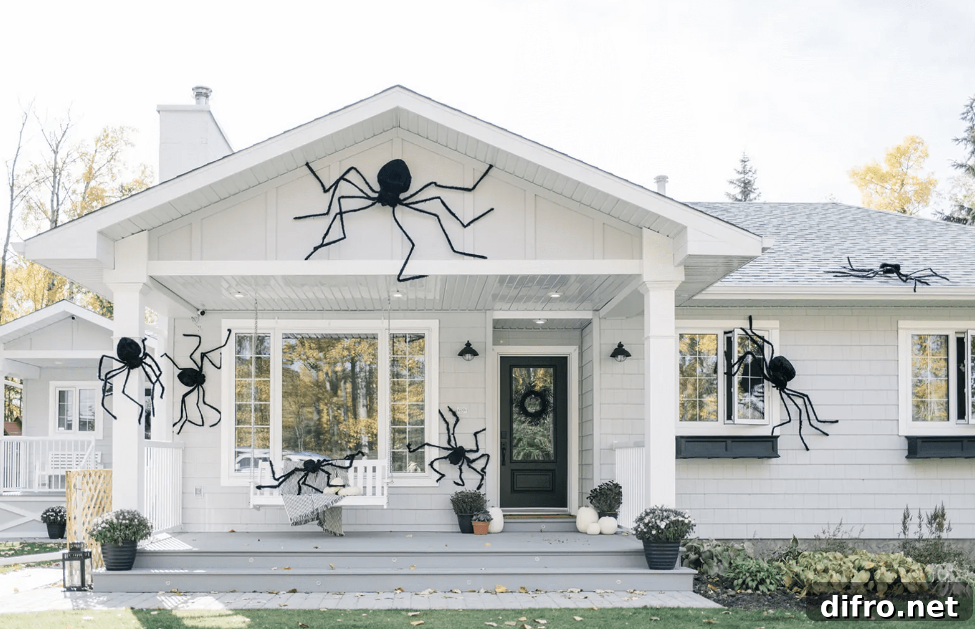Front porch with giant spider decorations