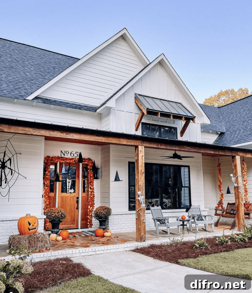 Traditional Halloween porch with pumpkins and witch hats