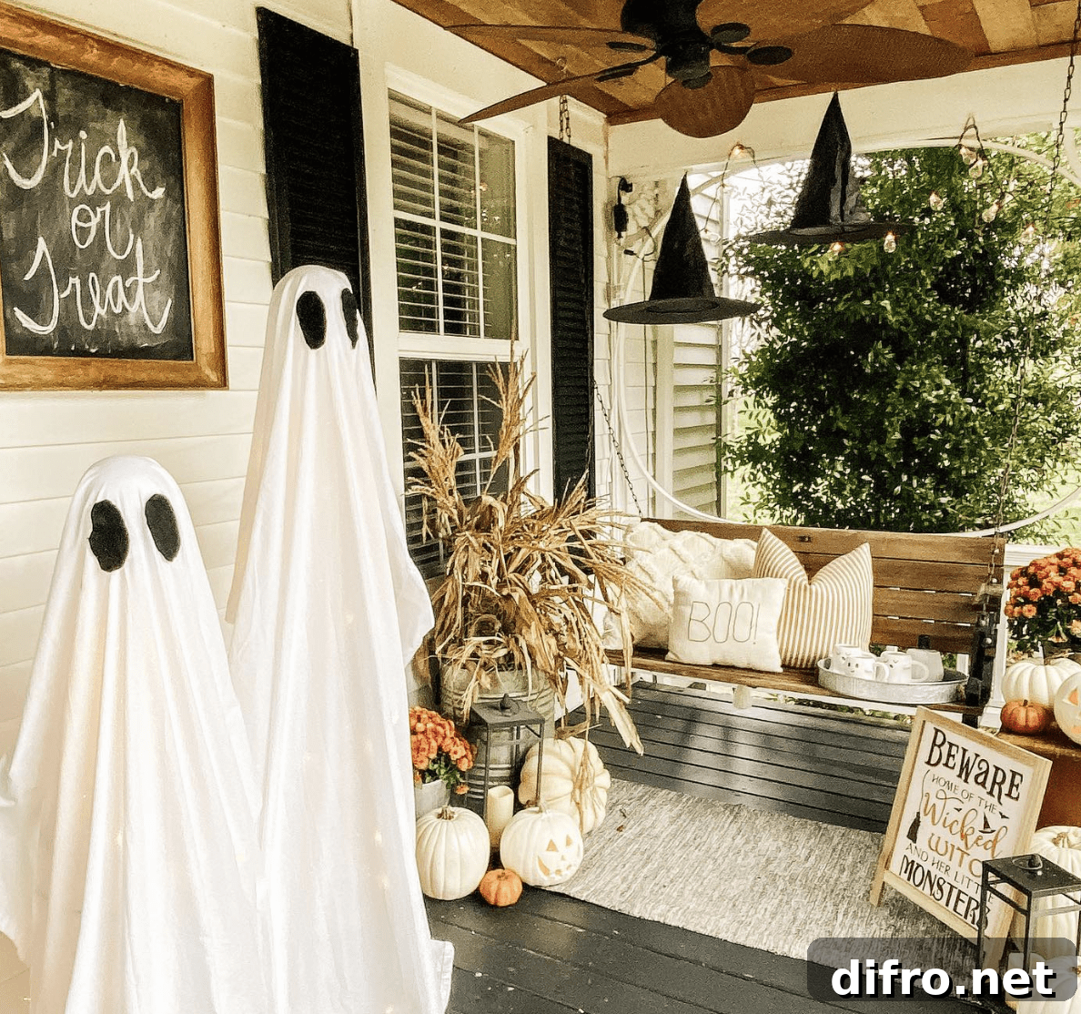 DIY ghost decorations on a porch