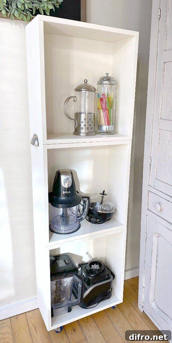 White rolling storage for appliances in the kitchen.